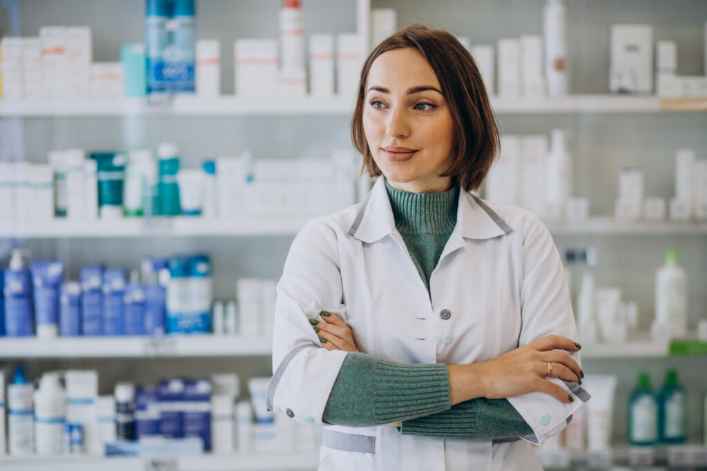 Young woman pharmacist at pharmacy